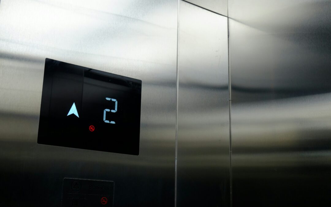 A close-up of the floor indicator display panel in the interior of an elevator.